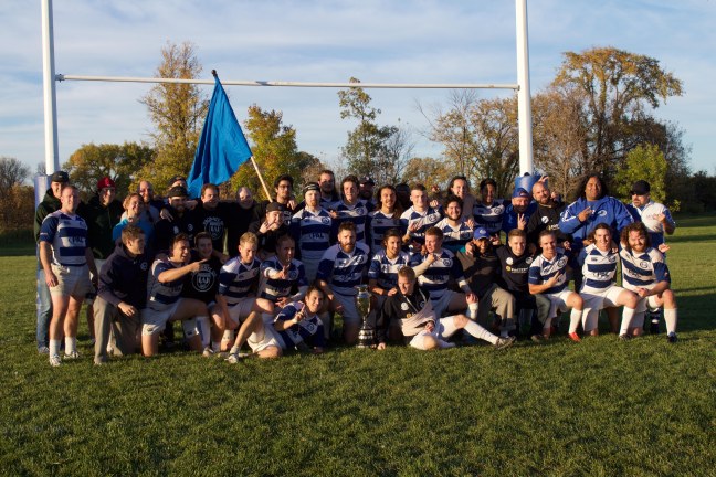 The 2015 Division 1 Men’s Rugby Champions: The Assassins. Pictured along with all their reserve players and coaches on October 3, 2015/ STEPHANIE SETKA